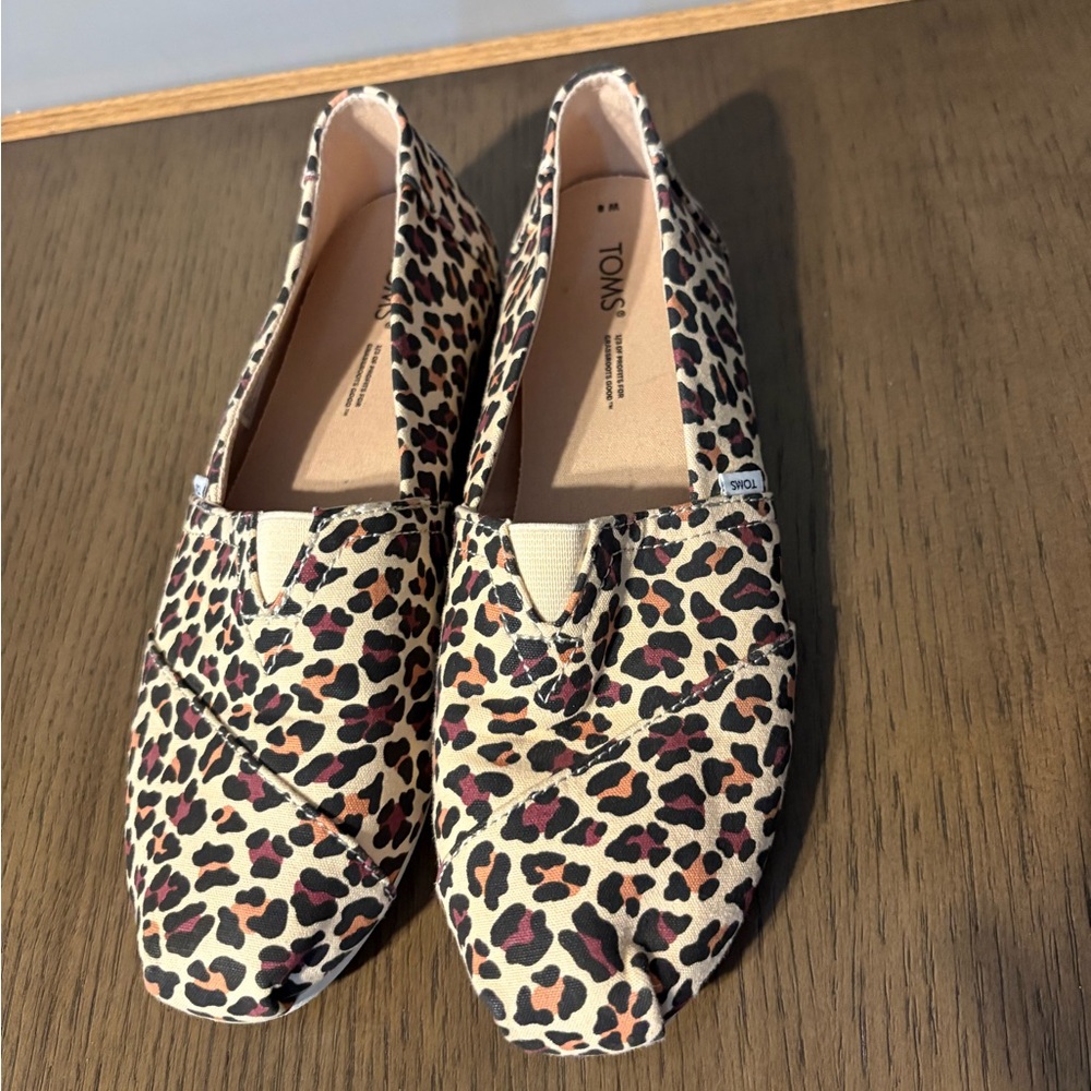 TOMS Leopard Print Slip-On Flats in Tan, Black & Pink